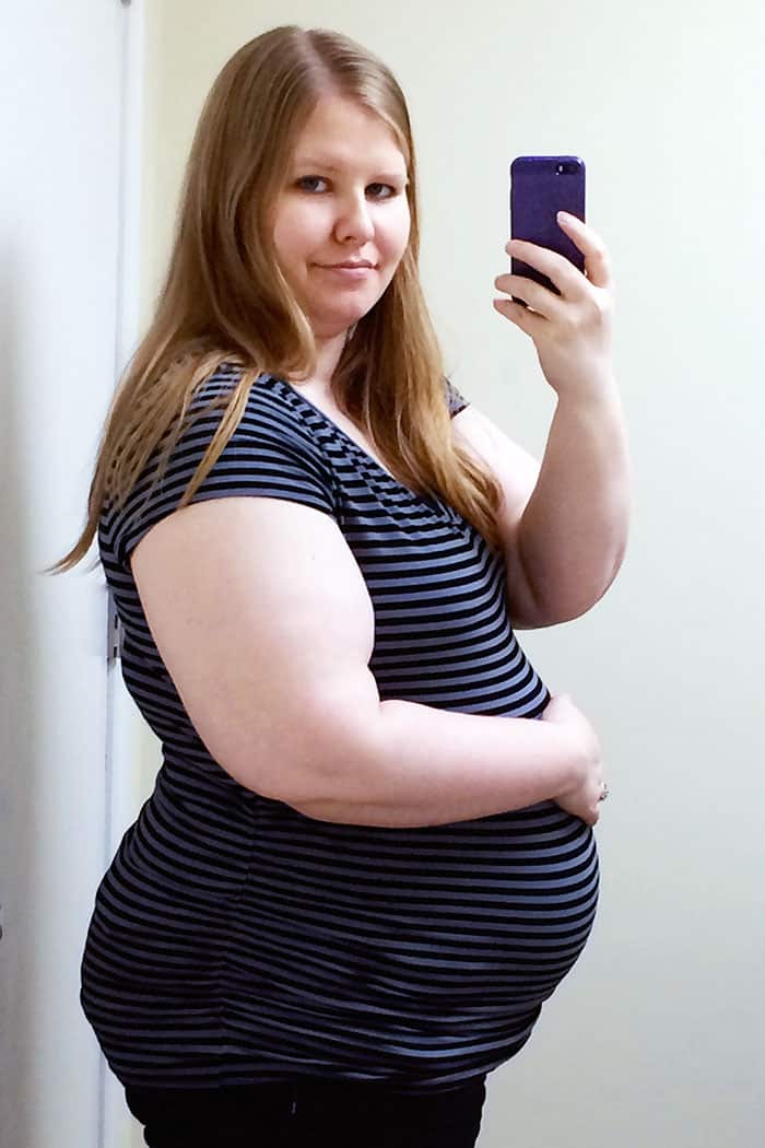 baby bump week 25 pregnant obese woman photo