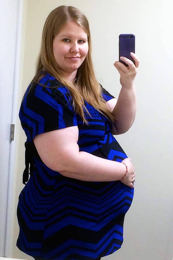 baby bump week 27 pregnant obese woman photo