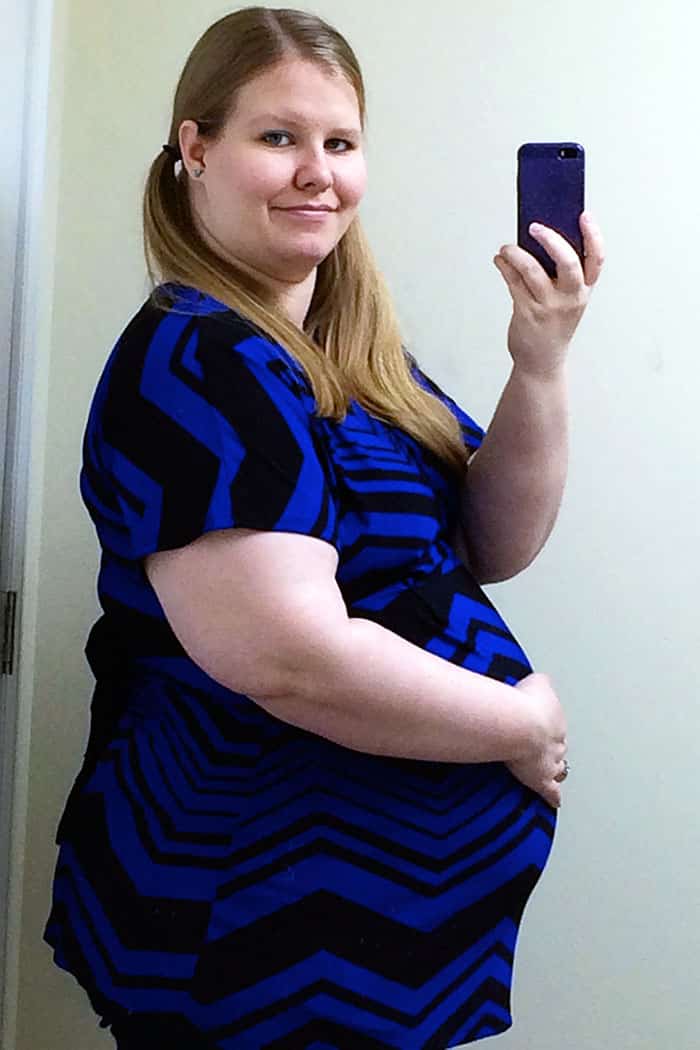 baby bump week 29 pregnant obese woman photo