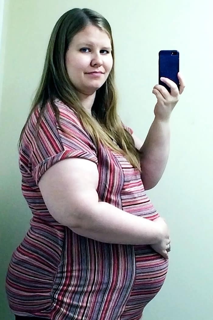 baby bump week 31 pregnant obese woman photo