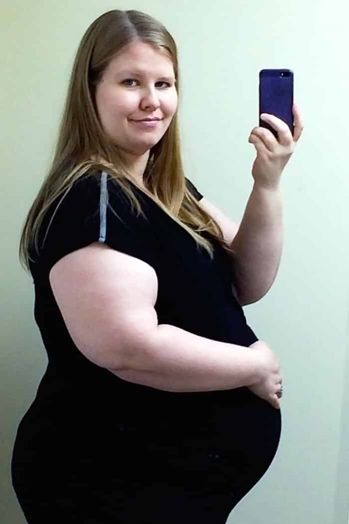 baby bump week 32 pregnant obese woman photo