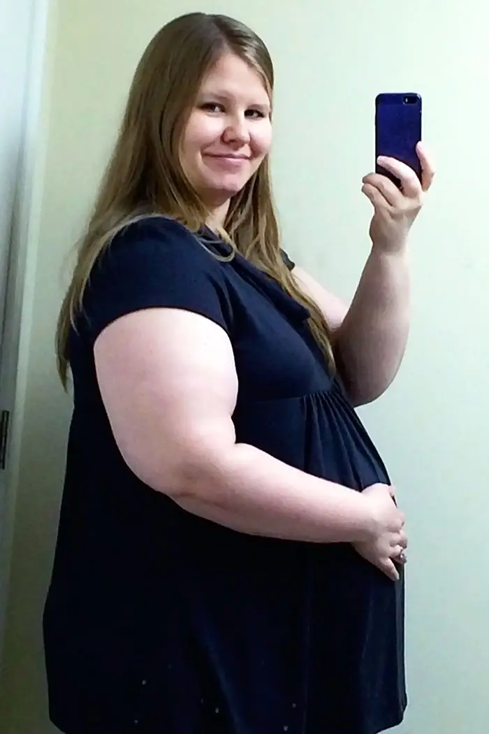 baby bump week 34 pregnant obese woman photo