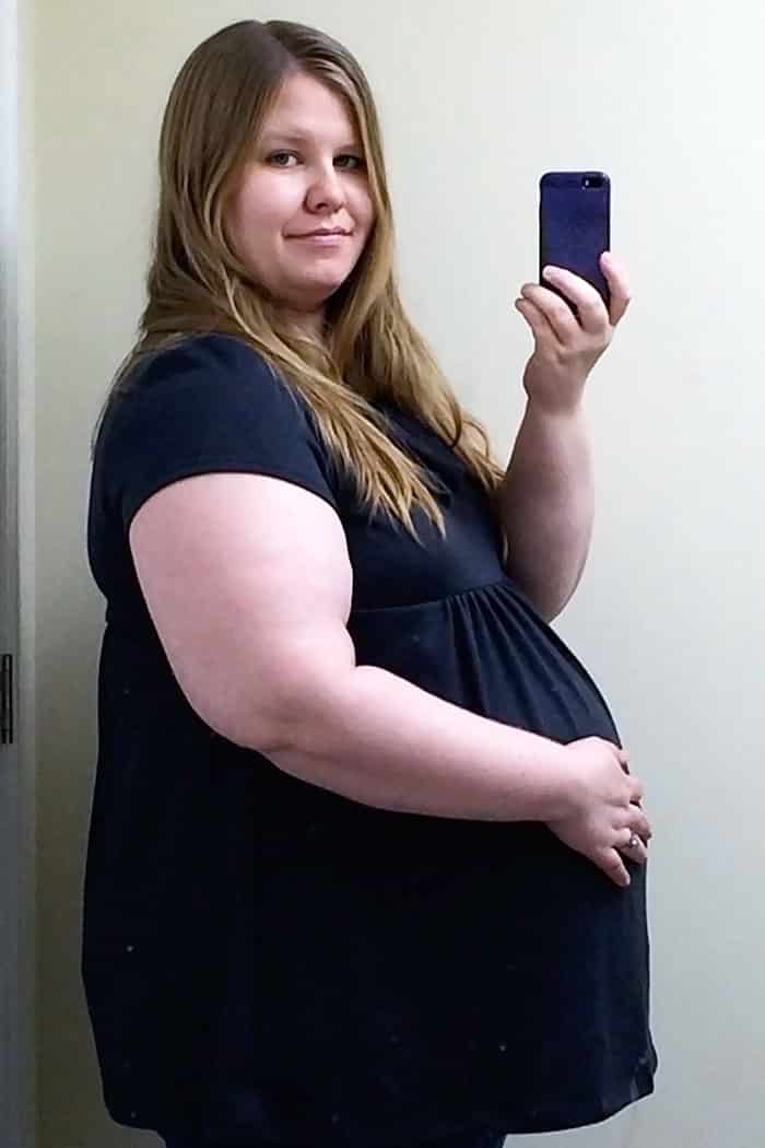 baby bump week 36 pregnant obese woman photo