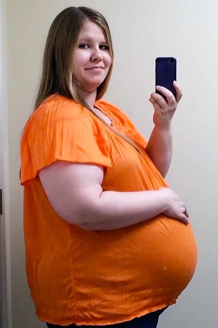 baby bump week 38 pregnant obese woman photo