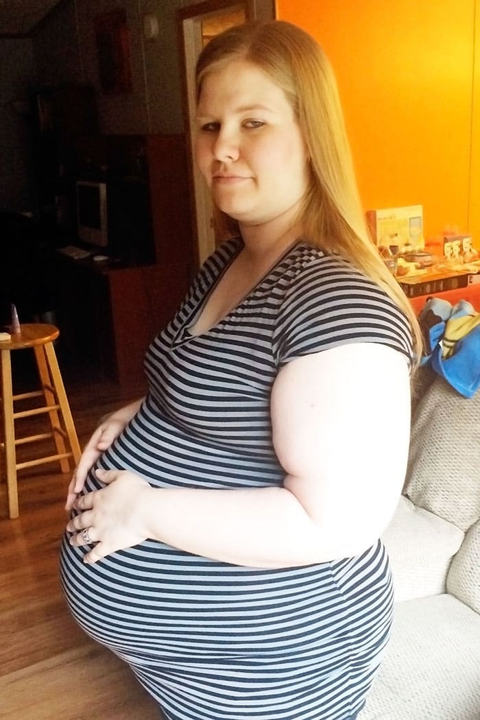 baby bump week 39 pregnant obese woman photo