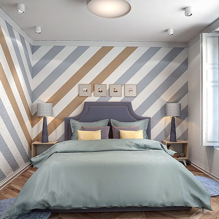 bold stenciled diagonal stripes on bedroom walls