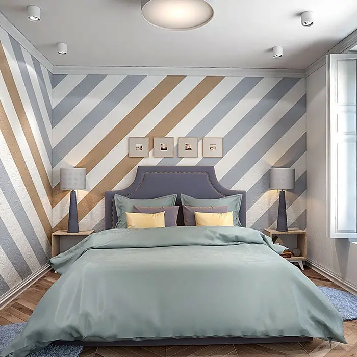 bold stenciled diagonal stripes on bedroom walls