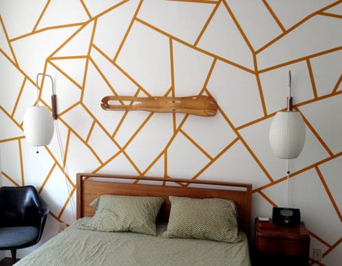 funky geometric line design on a bedroom wall