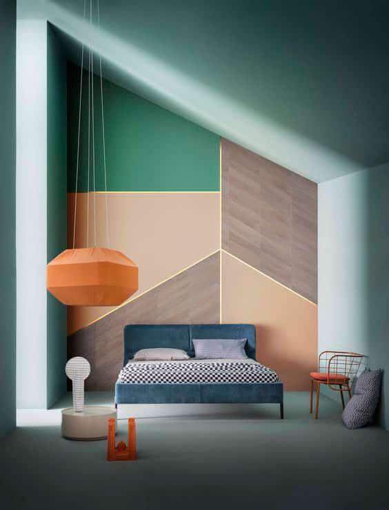 peach, green and wood geometric design accent bedroom wall with gold tape lines