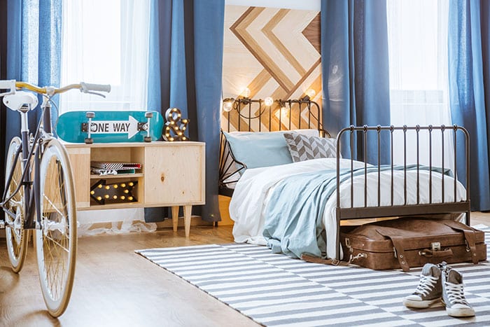 wooden arrow chevron geometric wall design in boy's bedroom