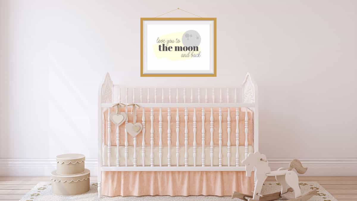 free nursery printable over a crib in baby's room