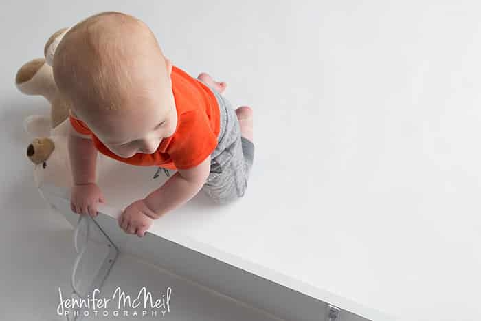 11 month old in shelf series photography
