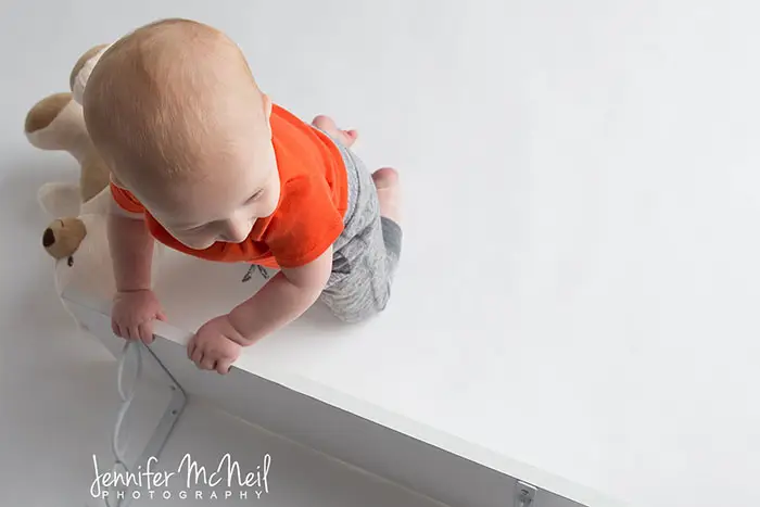 11 month old in shelf series photography