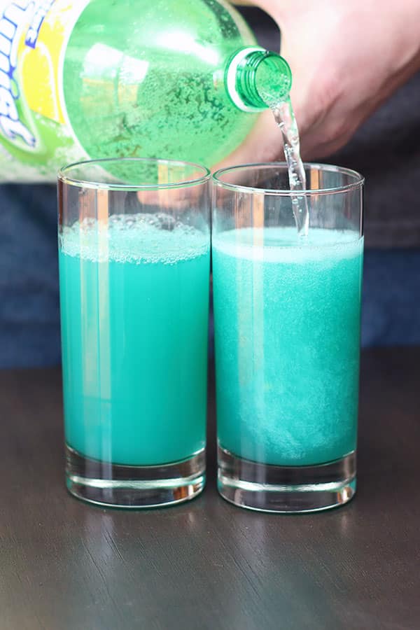 pouring lemon-lime soda into sonic screwdriver cocktail glasses