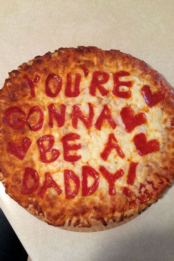 you're gonna be a daddy written in pepperoni on a pizza