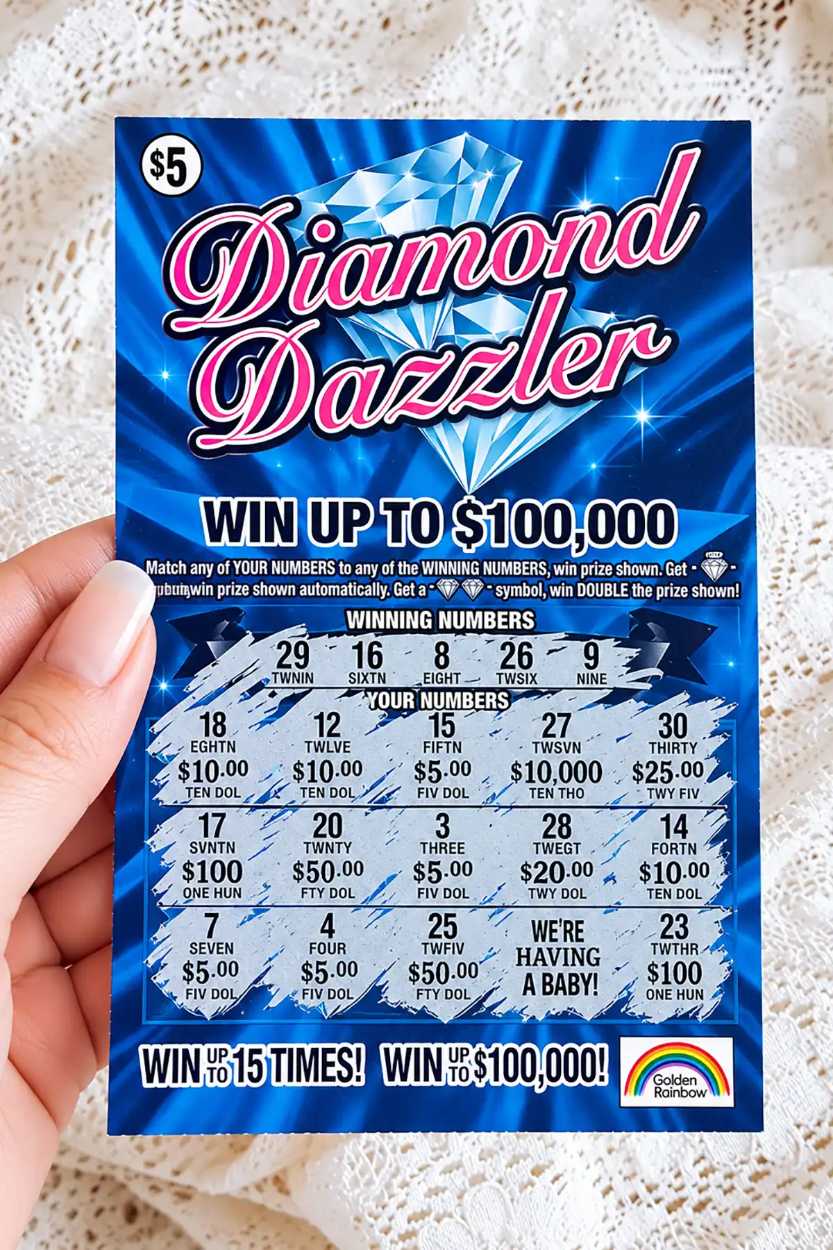 Diamond Dazzler scratch-off lottery ticket revealing We're Having a Baby as a creative pregnancy announcement.