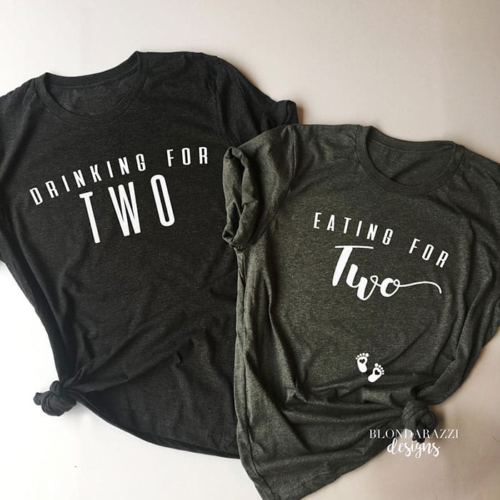 two t-shirts that read "drinking for two" and "eating for two" with small footprints on the stomach of the second