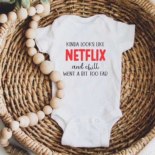 baby onesie flat lay featuring Netflix logo