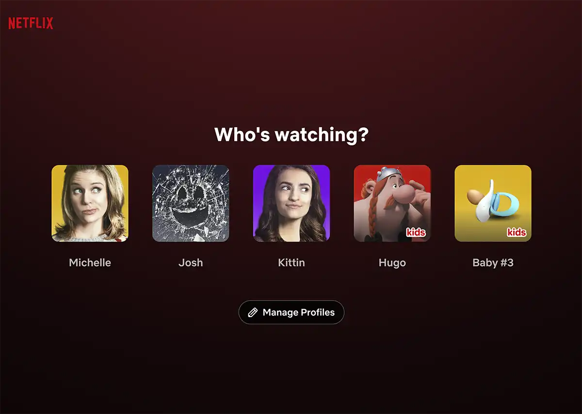 Netflix-inspired profile selection screen showing a Baby #3 profile with a pacifier as a creative pregnancy announcement.