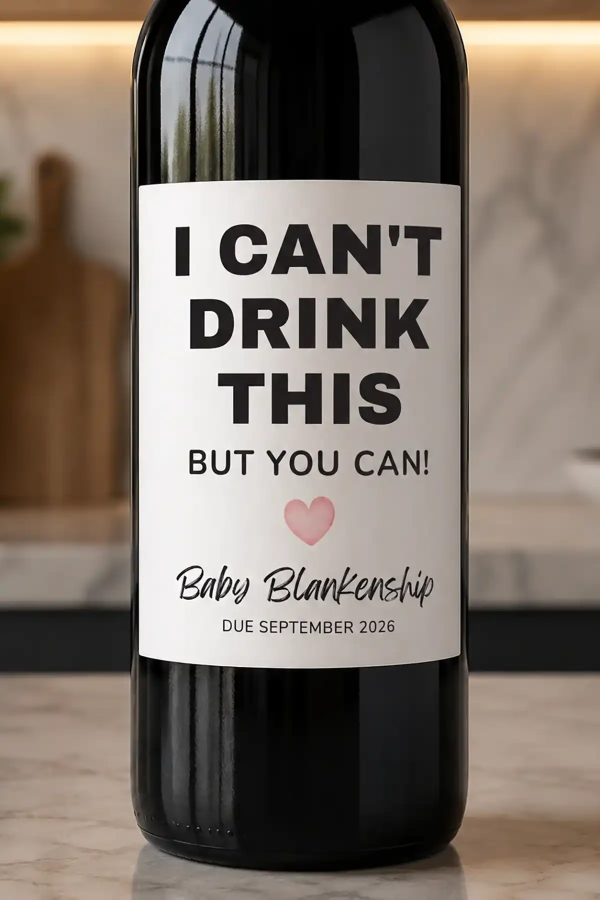 Custom wine bottle label reading I Can't Drink This But You Can with Baby Blankenship due September 2026.