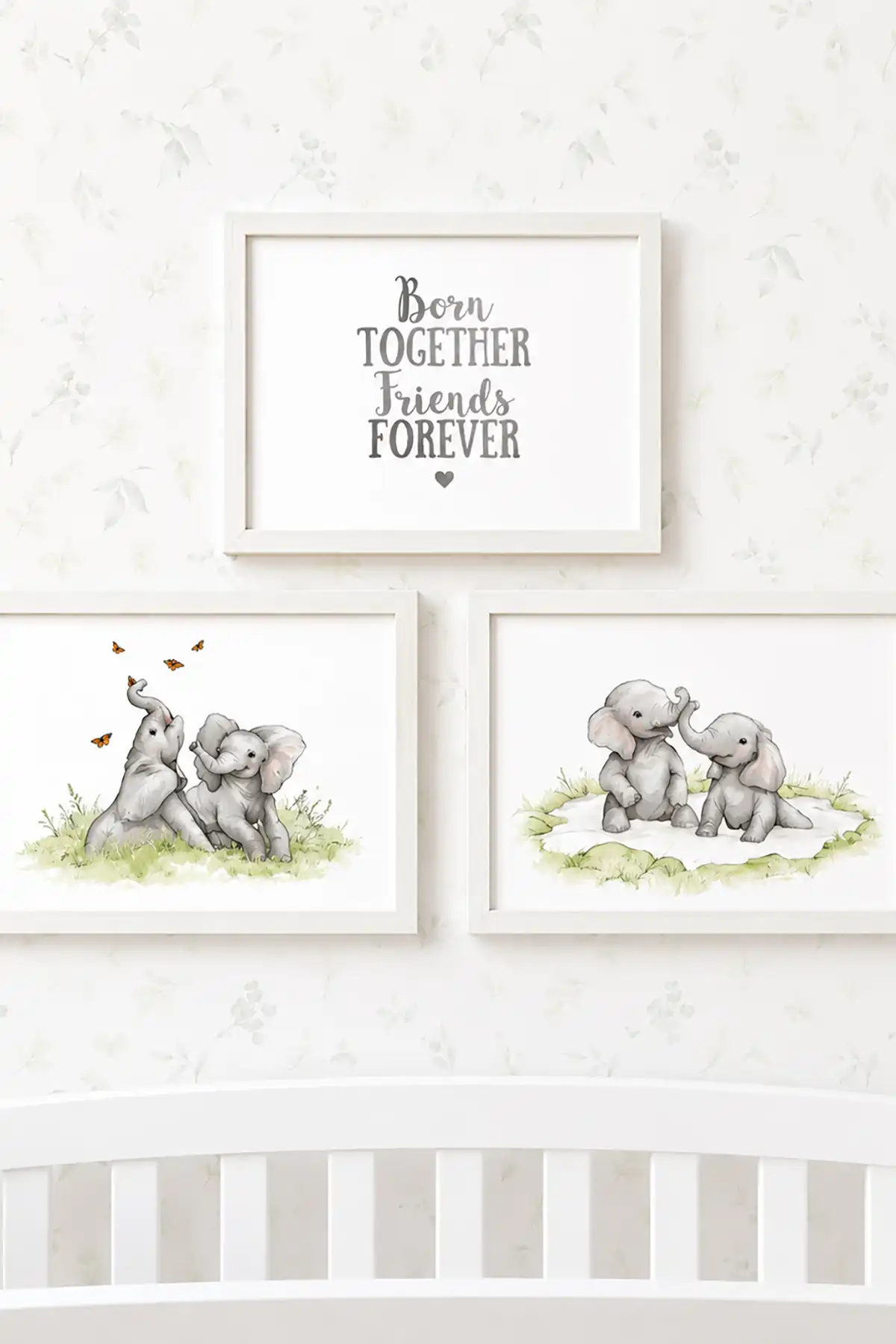 Twin nursery wall decor featuring watercolor baby elephants and Born Together Friends Forever artwork above a white crib.