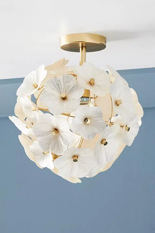 a floral chandelier ball in a nursery