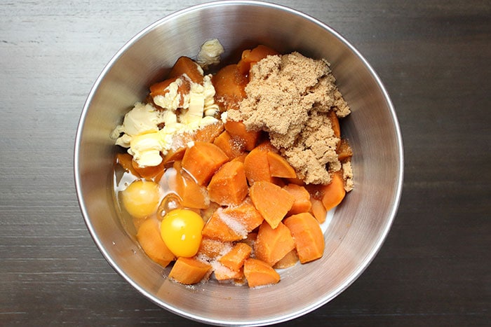 ingredients for mashed sweet potatoes in a mixing bowl