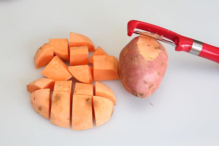 peeling and dicing sweet potatoes
