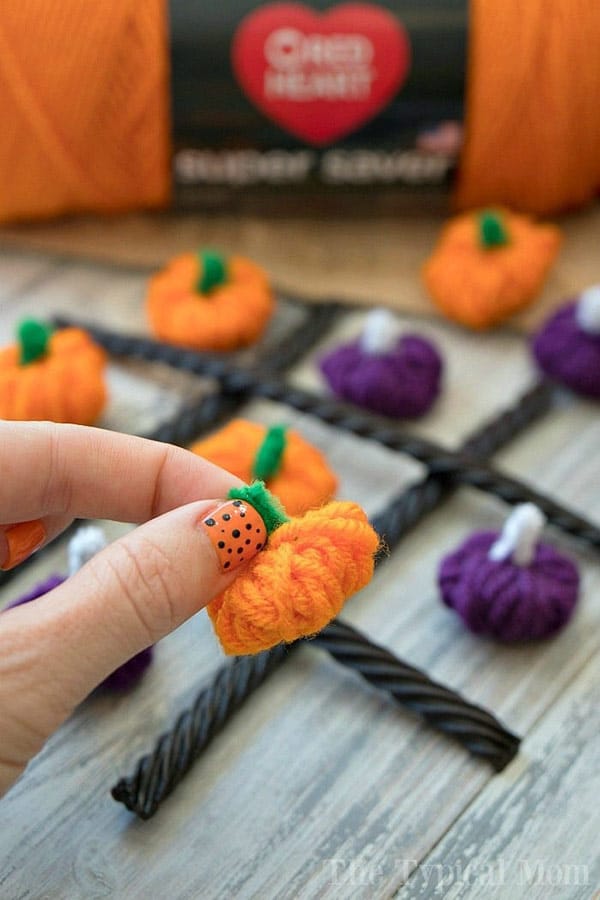DIY yarn pumpkins tic tac toe game