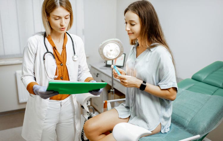 young woman visiting a female gynecologist