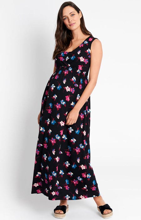 pregnant woman wearing a maternity and nursing maxi dress