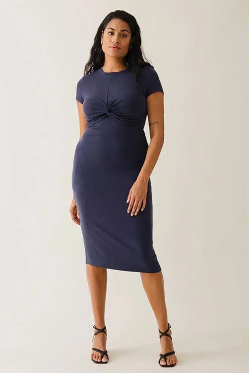 pregnant woman wearing a maternity party dress