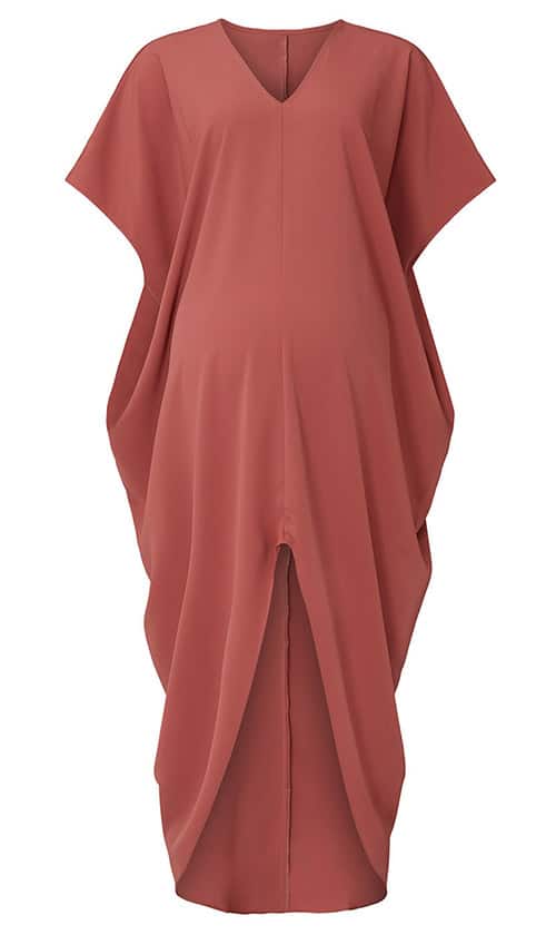 soft red short-sleeved, flowing maternity dress with center slit