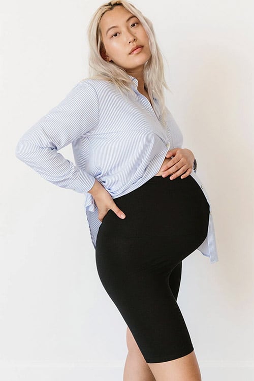 pregnant woman wearing black maternity bike shorts