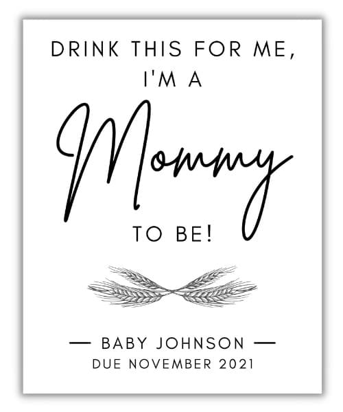printable pregnancy announcement wine label that says "Drink this for me, I'm a Mommy to be!"