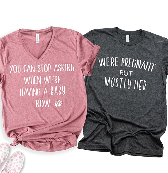 pregnancy announcement shirts that say "you can stop asking when we're having a baby now" and "we're pregnant but mostly her"