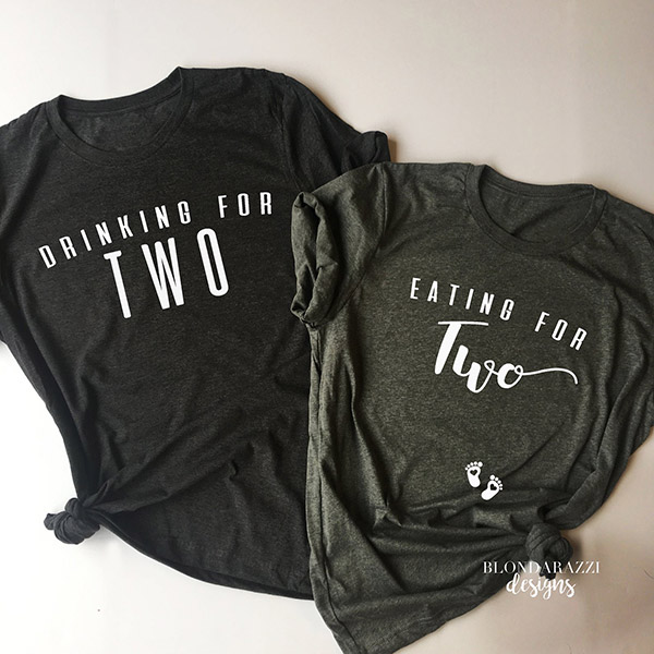 two t-shirts that say "drinking for two" and "eating for two" with the latter showing tiny footprints on the stomach