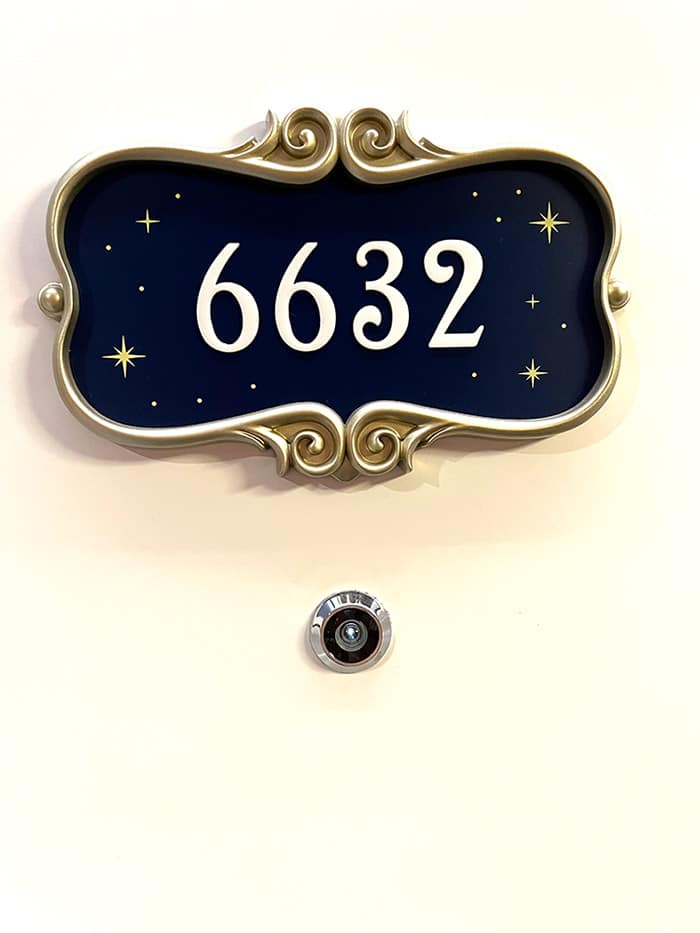 closeup of the new stateroom number plaque shape on the Disney Wish