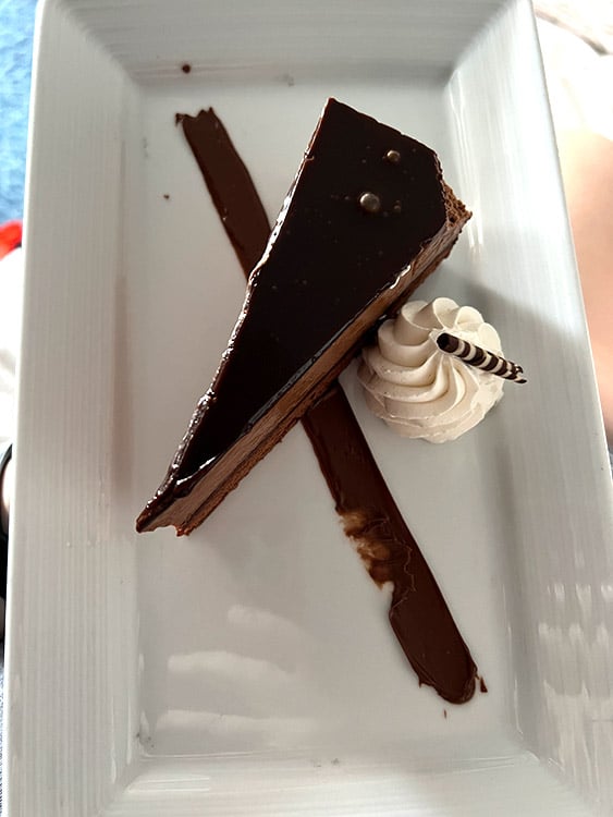 slice of room service chocolate cake on the Disney Wish