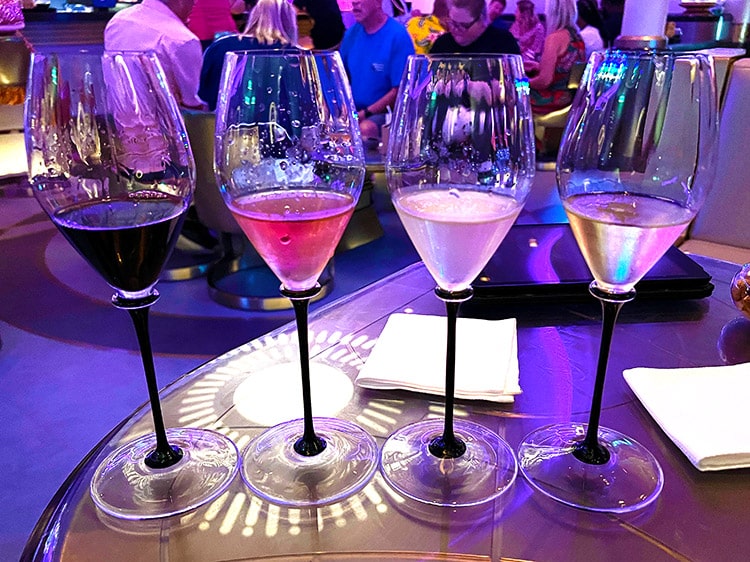 four wine glasses comprising the Flight of Skywalker from Hyperspace Lounge on the Disney Wish