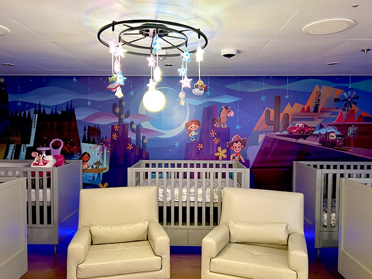 the crib/napping area of it's a small world nursery on Disney Wish