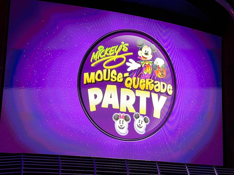 Mickey's Mouse-querade Party sign on the Disney Wish Funnel Vision screen