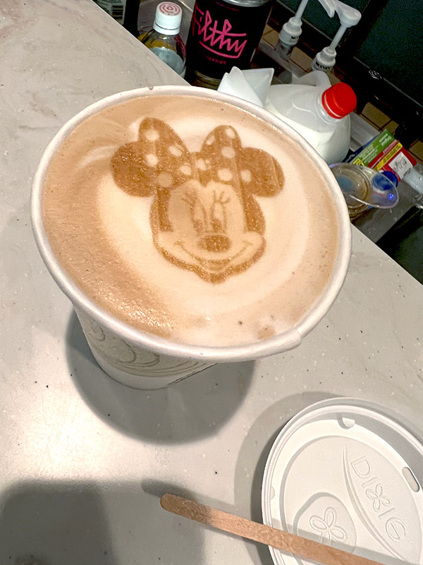 closeup of a mocha coffee on Disney Wish with an image of Minnie Mouse in the foam