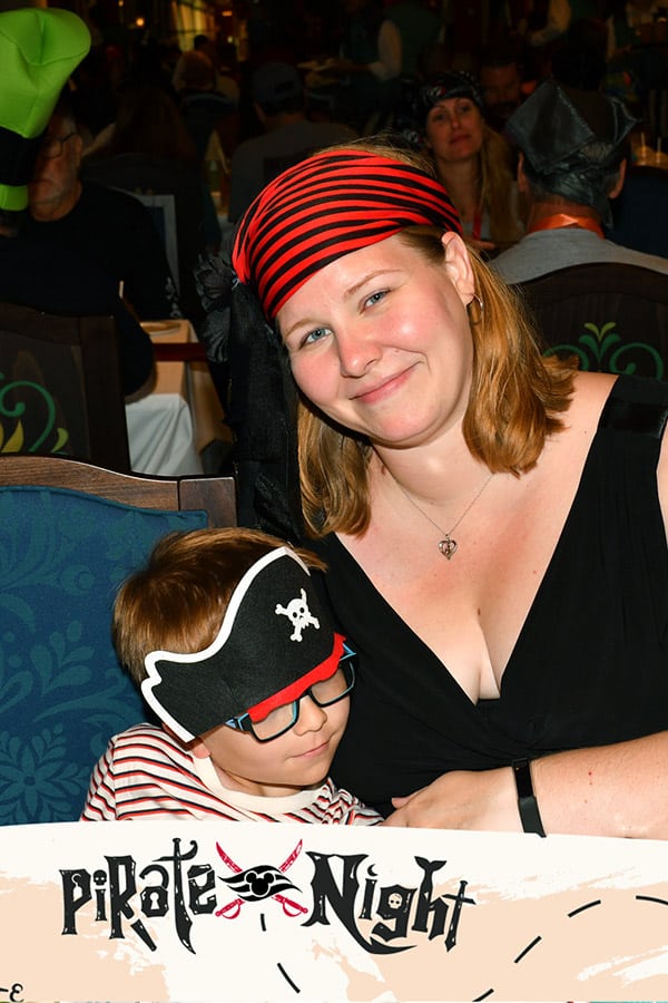a mother and son dressed as pirates on Pirate Night on the Disney Wish