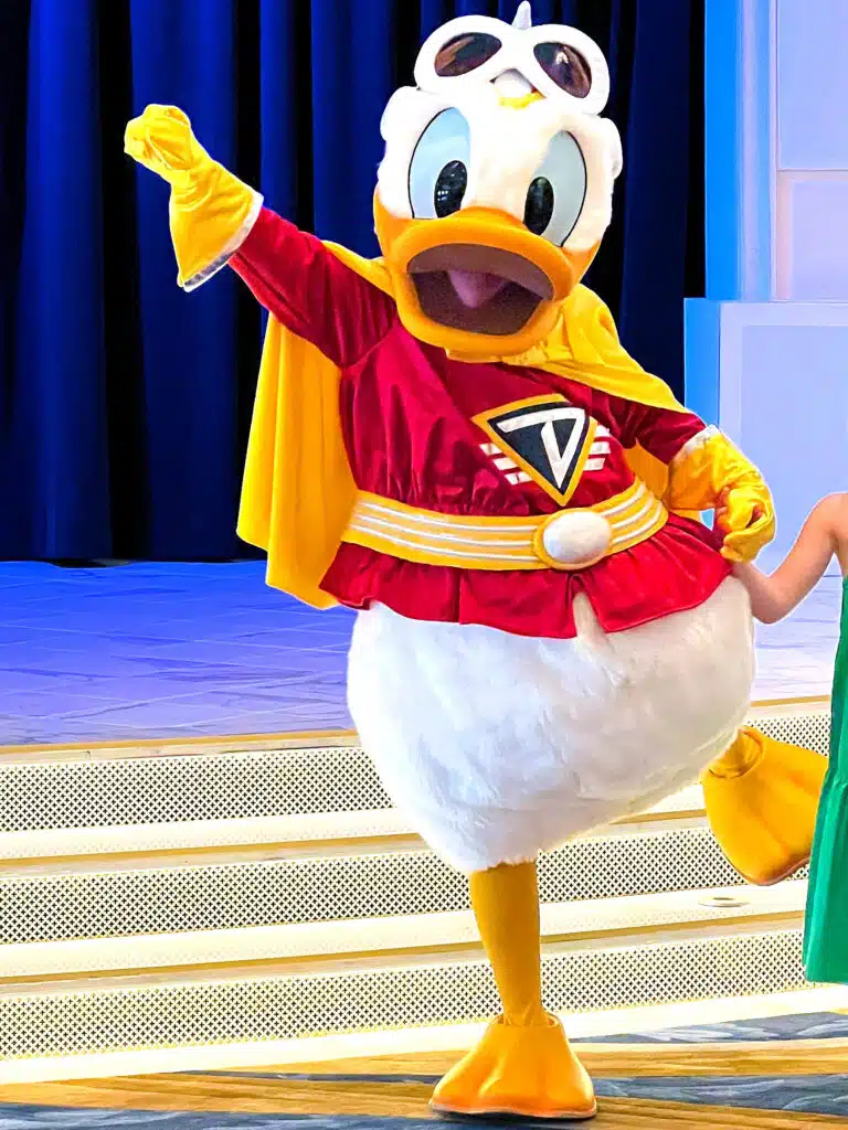 Donald Duck dressed as a super hero on a Halloween cruise