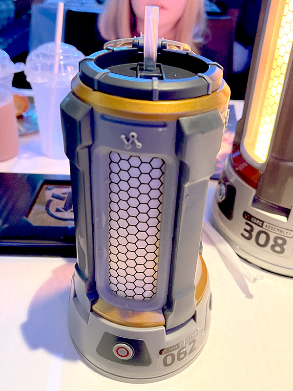 a souvenir Quantum Core sipper cup from Worlds of Marvel