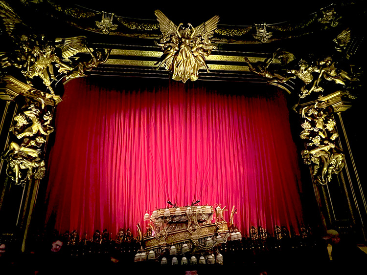 a wide view of the Majestic Theatre stage during intermission of the Phantom of the Opera before the chandelier is raised back up