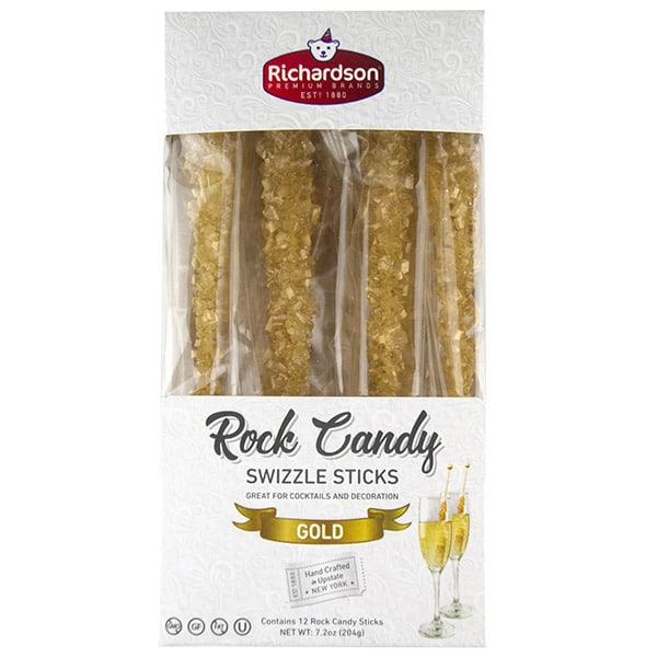 package of gold-colored rock candy on sticks