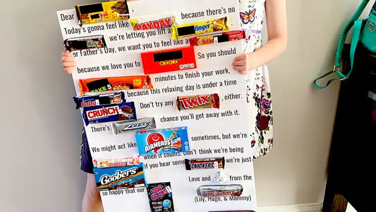 young children holding up a homemade Father's Day candy card gift