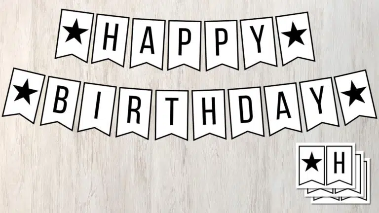 a black and white banner that says "Happy Birthday" with stars on the ends